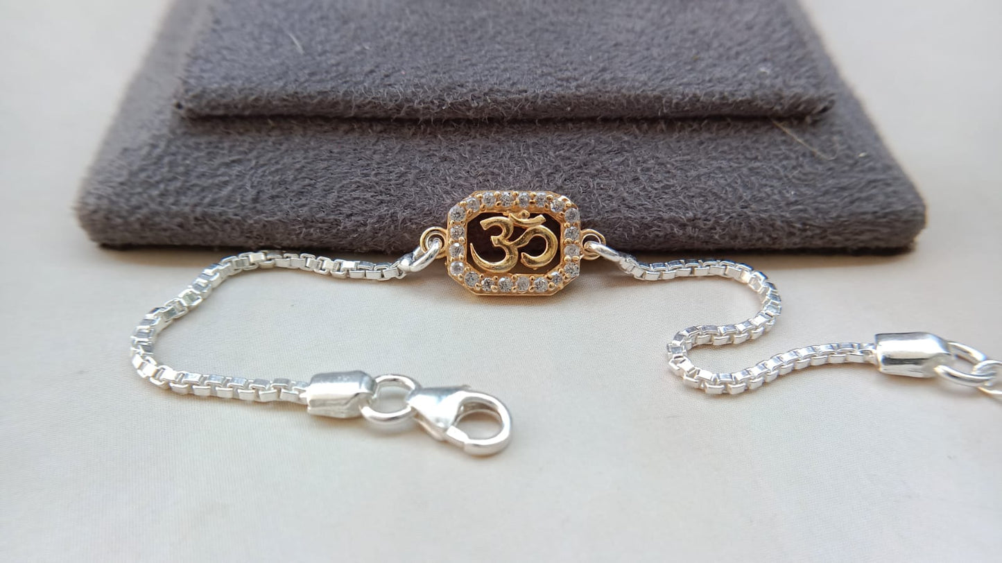 Om Rakhi with Sparkling Stone Border & Silver-Tone Chain ( kids )