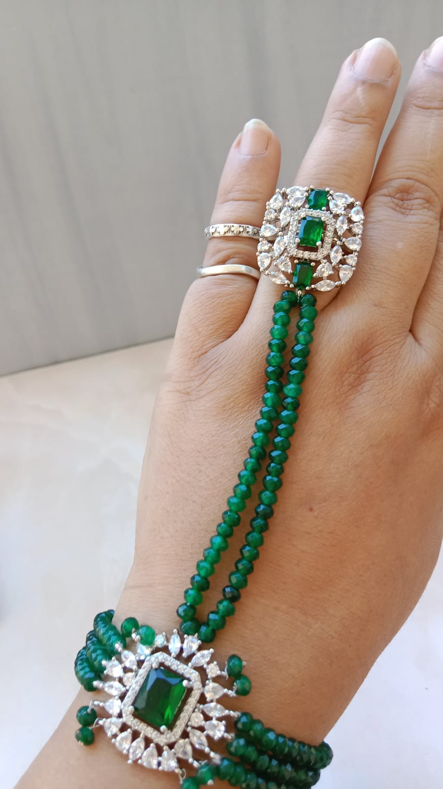 Rhodium plated Emerald Haathphool