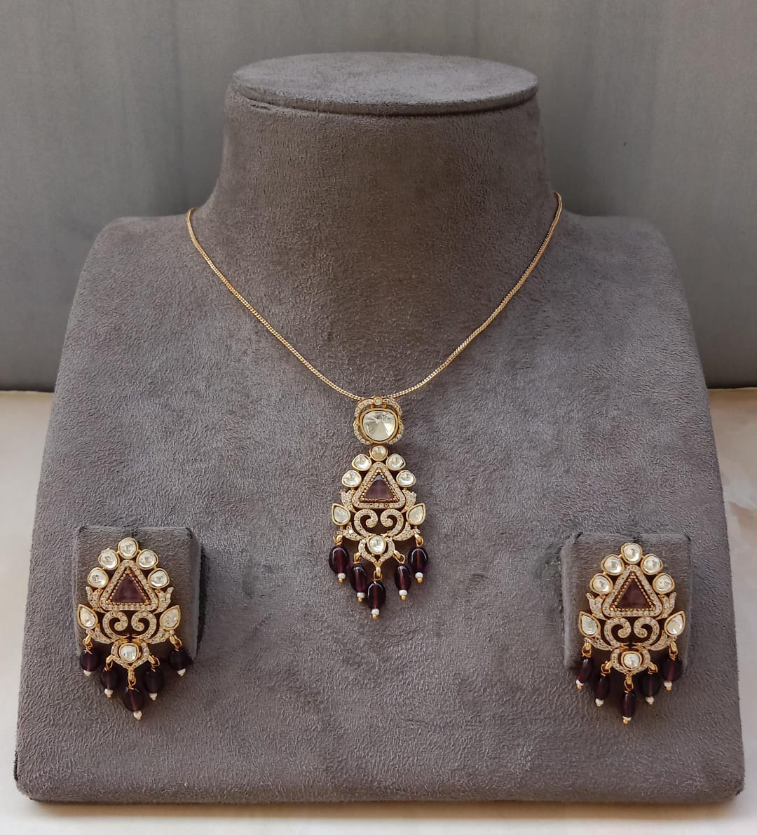 Gold Plated Kundan Pendant Set with Green, Pink & Purple Beads