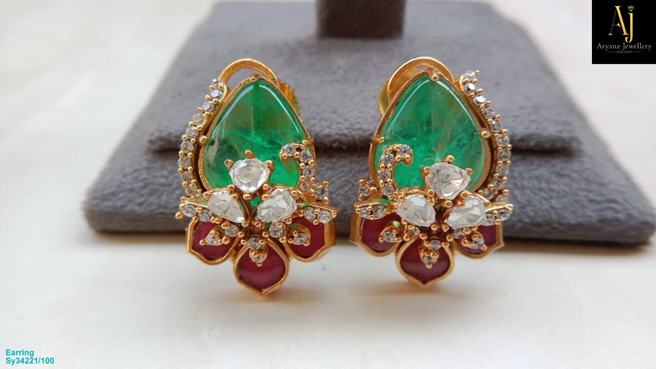 Elegant Polki Tops with Emerald Stone and Half-Floral Design