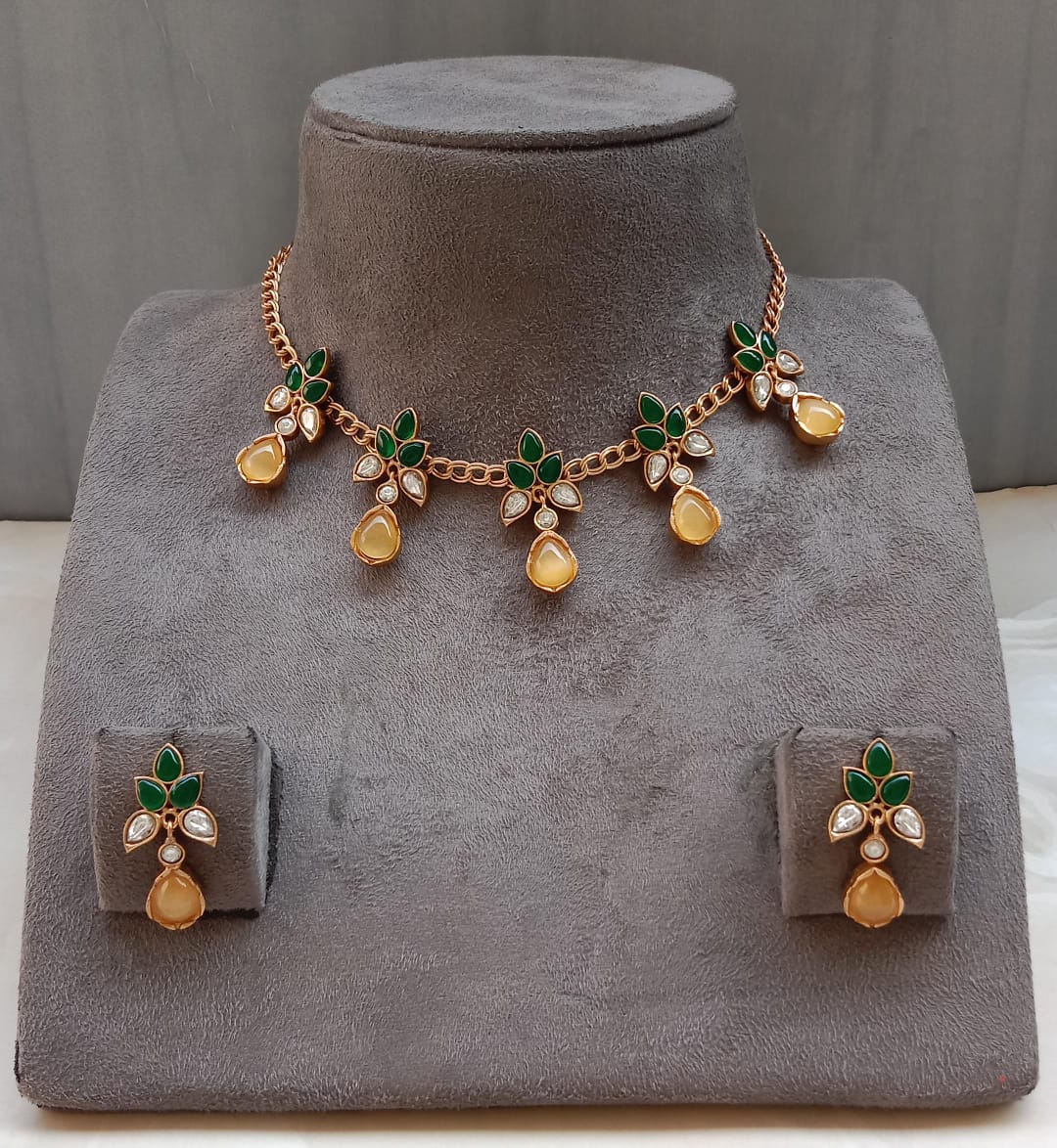 Polki Pendant Set with Yellow Drop & Green Leaf Design