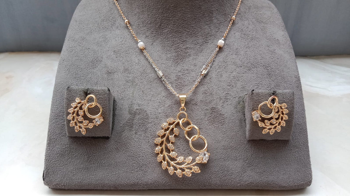 Gold Plated AD Leaf Pendant Set with Matching Earrings – Elegant Designer Jewellery Product Description