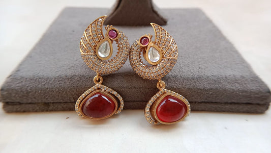 Polki Diamond Look Peacock Earrings with Ruby Stone & Gold Plating