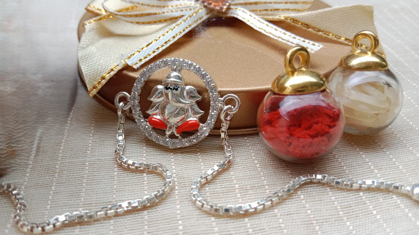 925 Pure silver Ganpati Rakhi Saffron