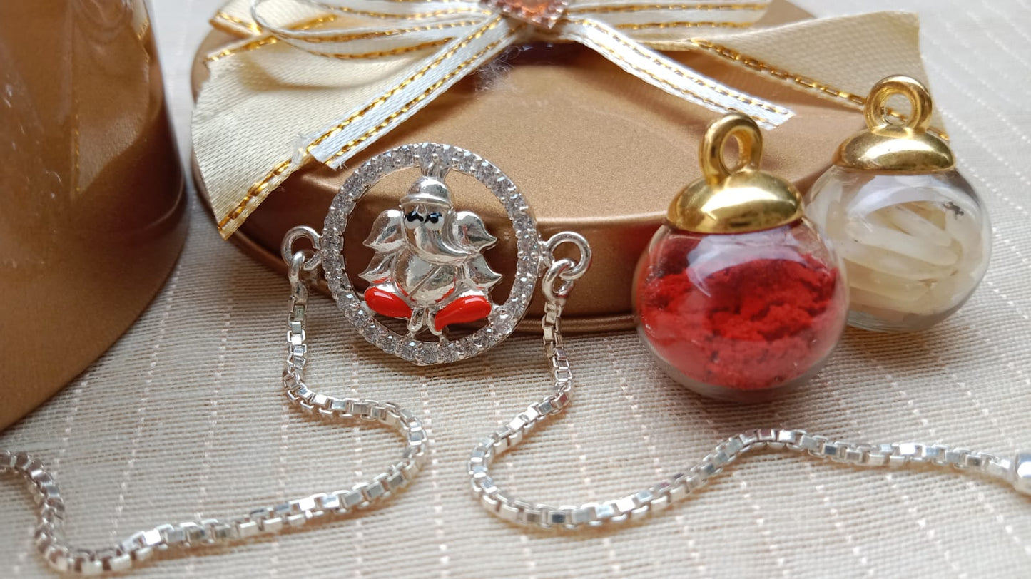 925 Pure silver Ganpati Rakhi Saffron