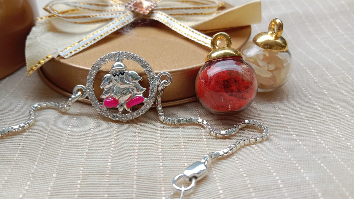 925 Pure silver Ganpati Rakhi Saffron