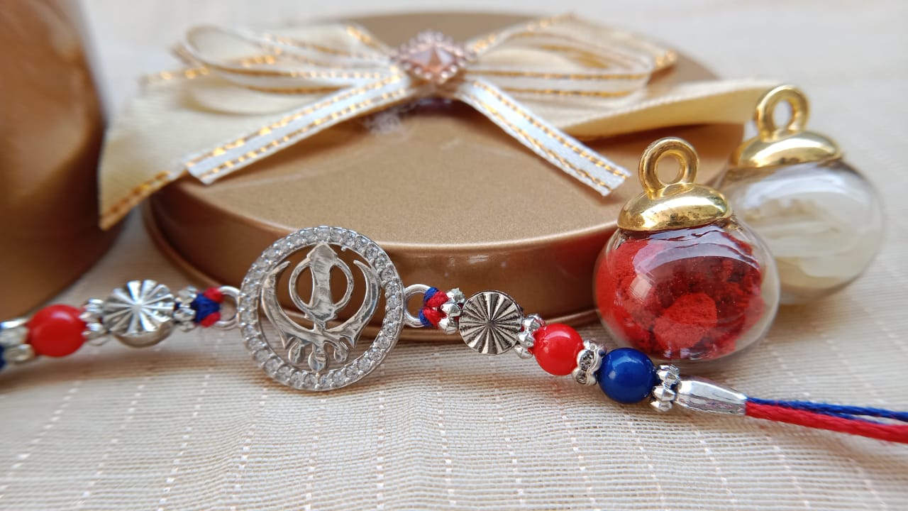 Khanda sahib Design Rakhi with Red & Blue Thread | Aryanz Jewellery
