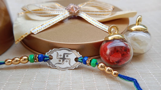 925 Pure Silver Swastik Rakhi with Blue & Green Beads