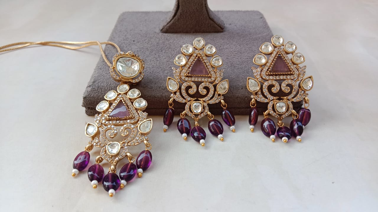 Gold Plated Kundan Pendant Set with Green, Pink & Purple Beads