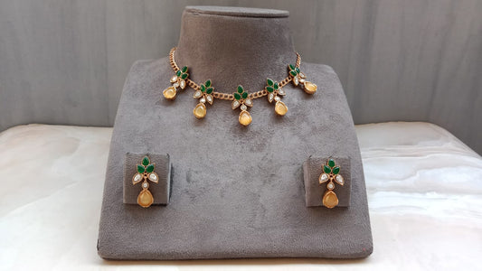 Polki Pendant Set with Yellow Drop & Green Leaf Design