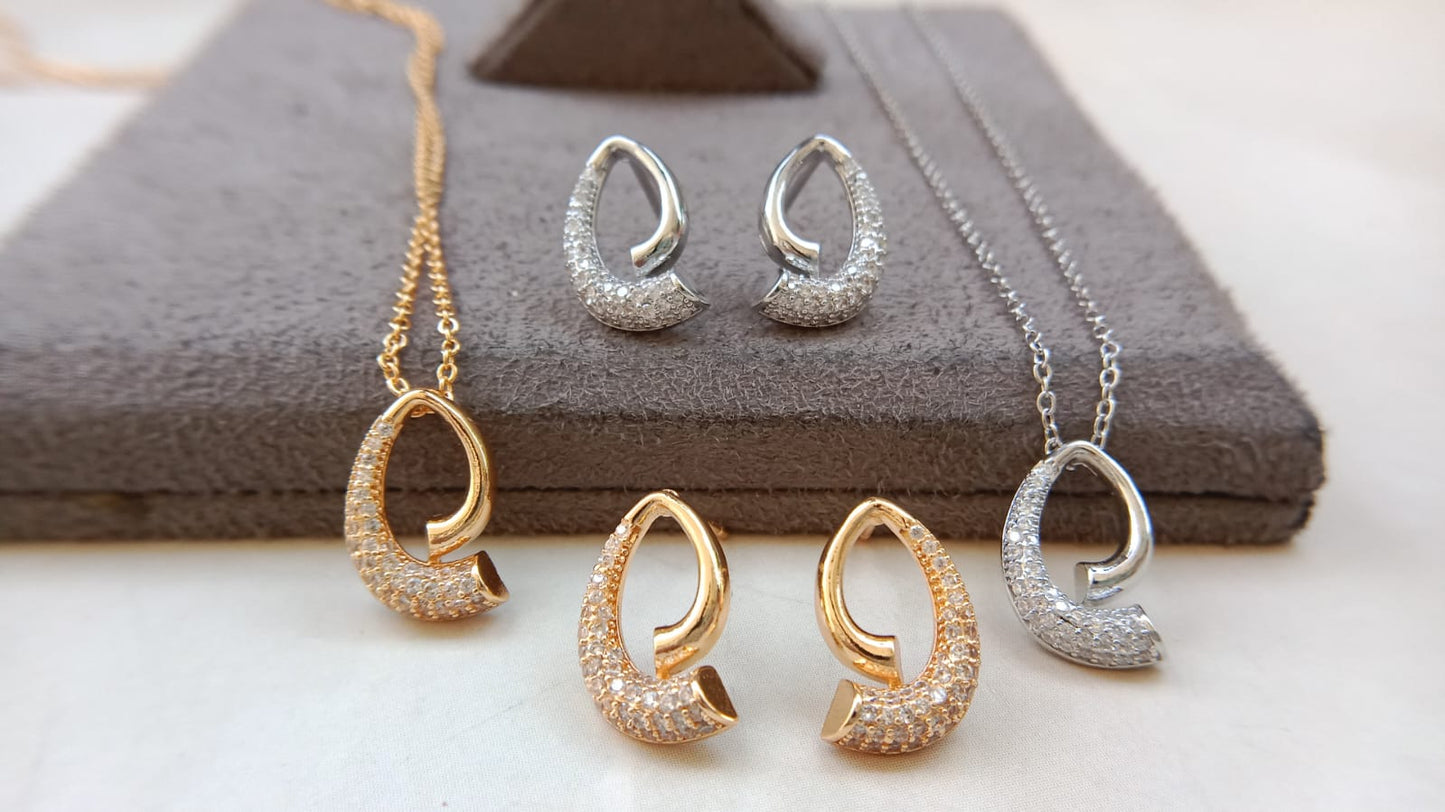 Twirl Elegance AD Pendant & Earrings Set – Gold & Rodium Finish