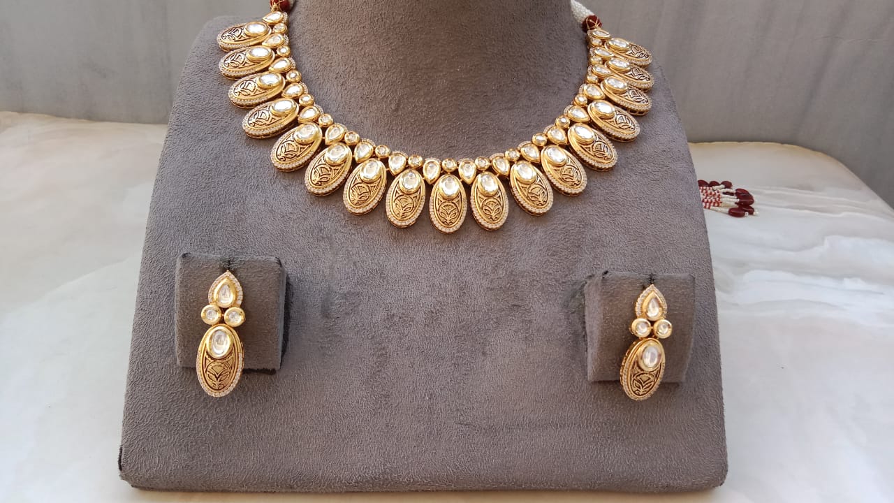 Golden Kundan Oval Drop Necklace Set with Matching Earrings