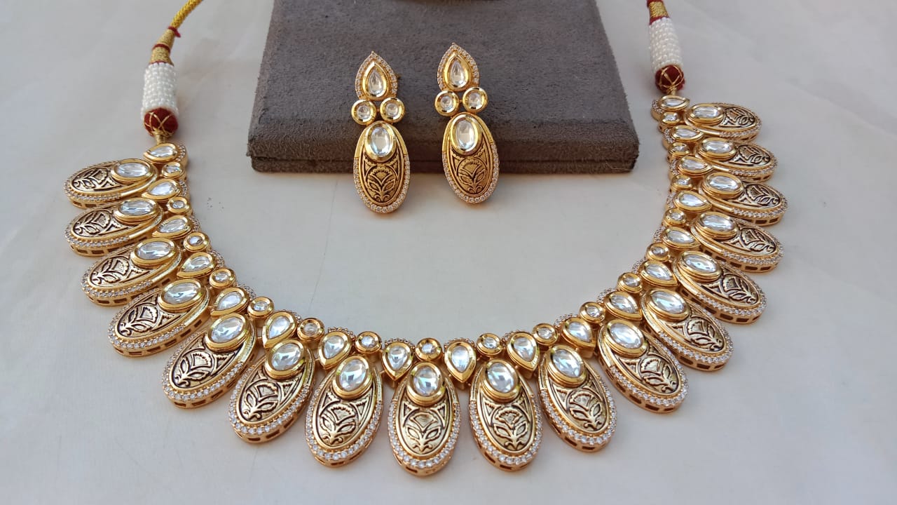 Golden Kundan Oval Drop Necklace Set with Matching Earrings