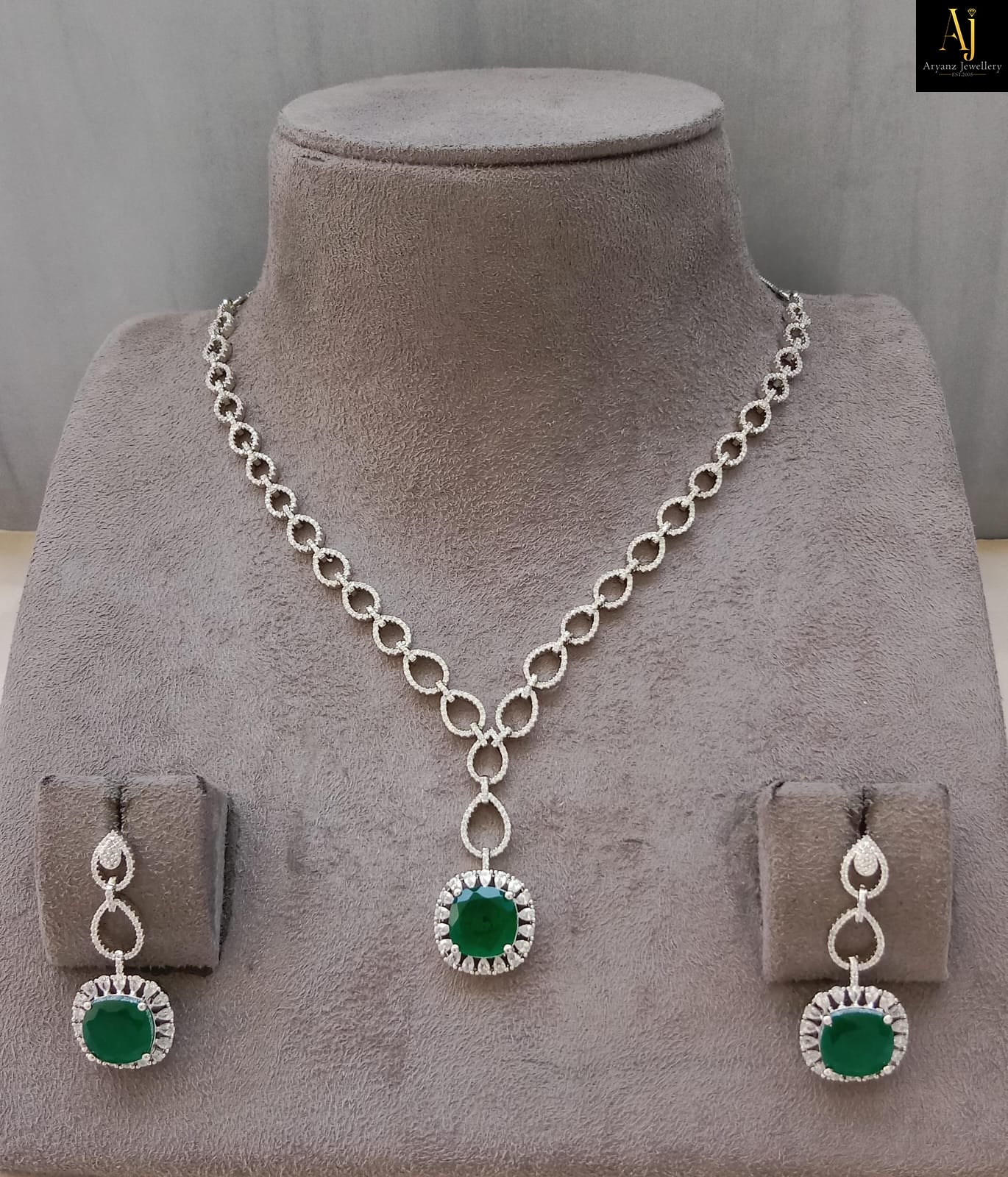 Luxury Emerald Green American Diamond Pendant Necklace Set | Rhodium Plated Party Wear Jewellery