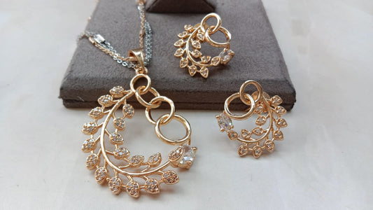 Gold Plated AD Leaf Pendant Set with Matching Earrings – Elegant Designer Jewellery  Product Description